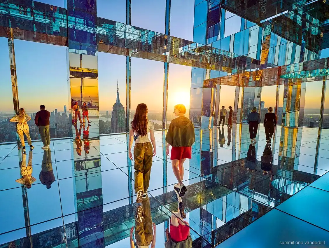 Visitors in the mirrored room at SUMMIT One Vanderbilt